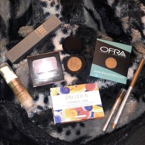 Lot of 8 makeup items with coloring pouch